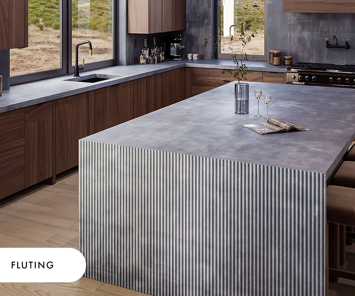 A fluted concrete kitchen island in the Purity pattern