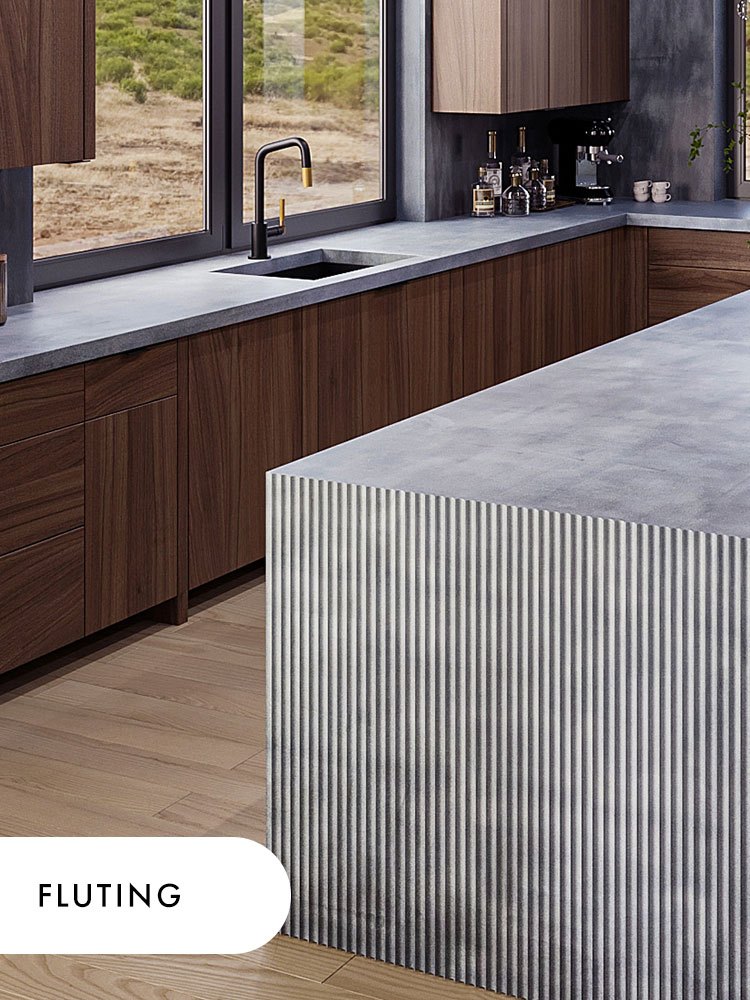 A fluted concrete kitchen island in the Purity pattern