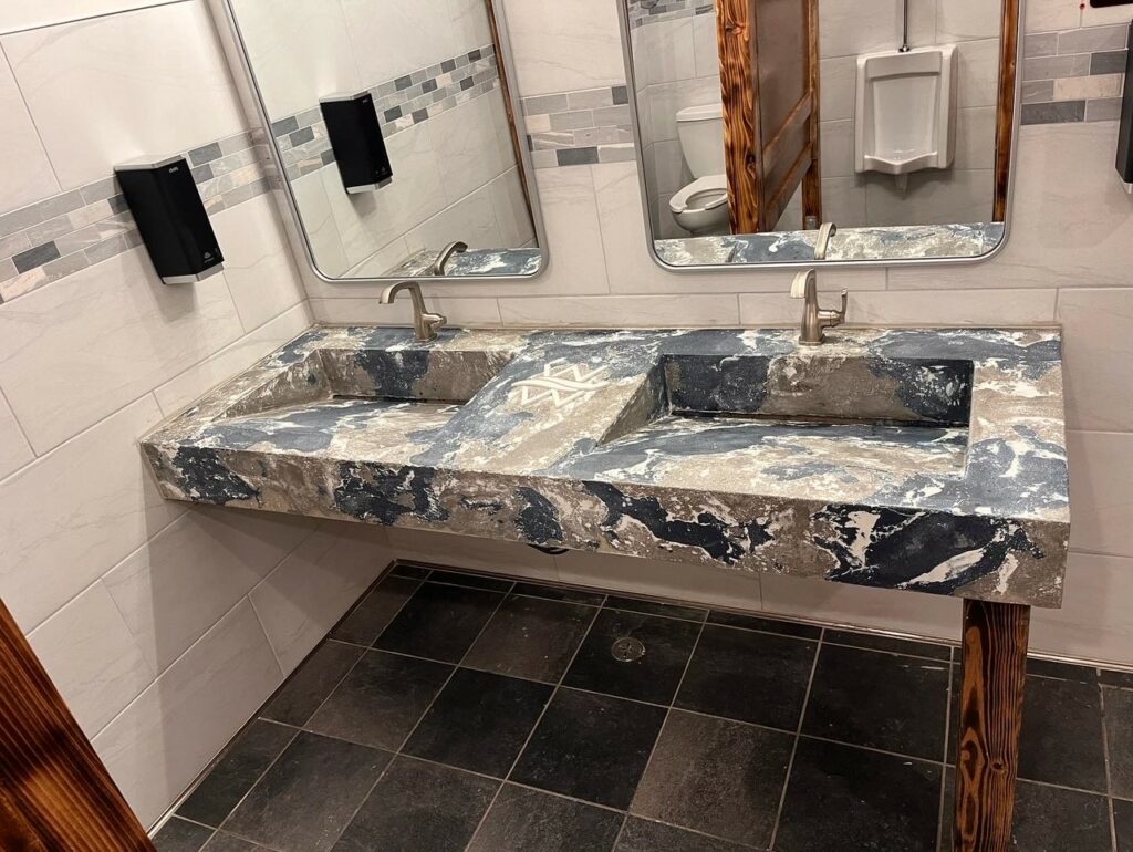 Concrete double ramp sink vanity