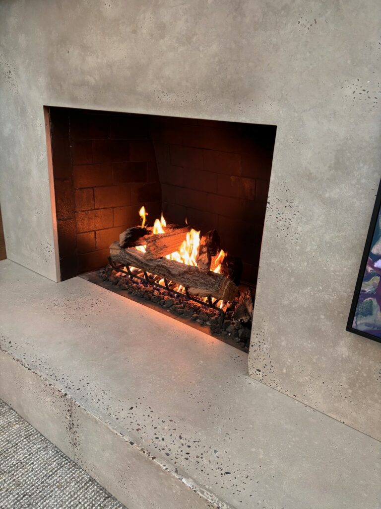 Concrete fireplace mantel and hearth