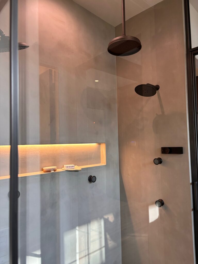 Concrete shower panels with integrated LED light