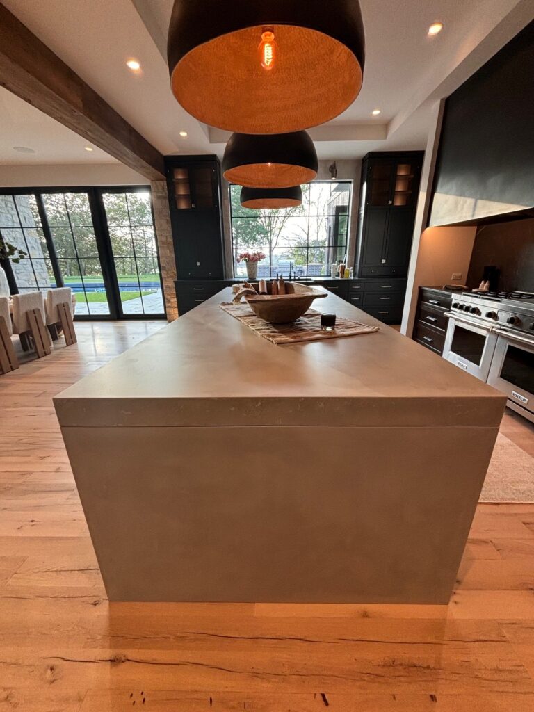 Double waterfall concrete kitchen island