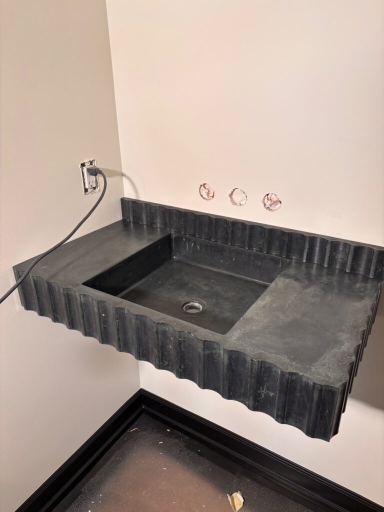 Fluted bathroom vanity in green