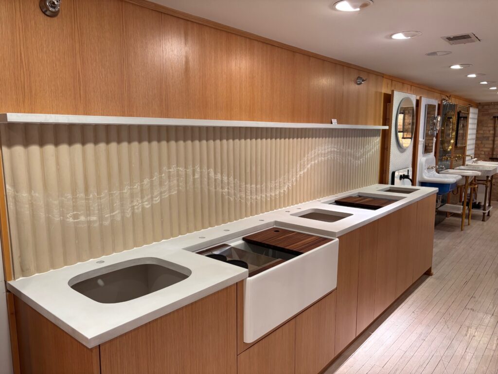 Reeded concrete showroom kitchen