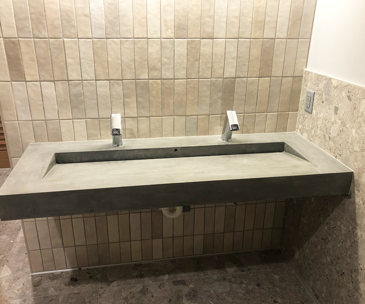 A concrete bathroom vanity in the Purity pattern